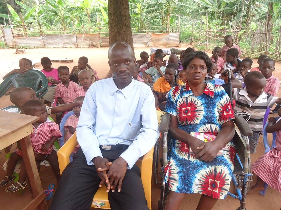 Leading Vision outreach to children learning under trees